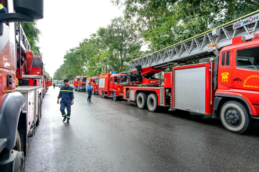 fire trucks parked on the street in city