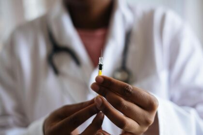 person holding injection