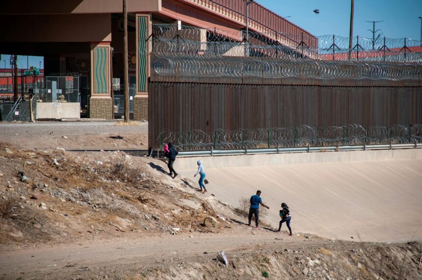 family crossing a border