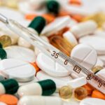 thermometer on medical pills