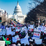 A DOJ report reveals 26 FBI informants were at the Capitol during the Jan. 6 riots, with most engaging in illegal activity. The findings challenge FBI narratives and spark calls for accountability.