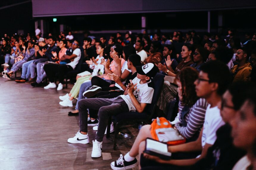 crowd clapping in the audience