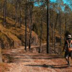 man and kid walking on downhill