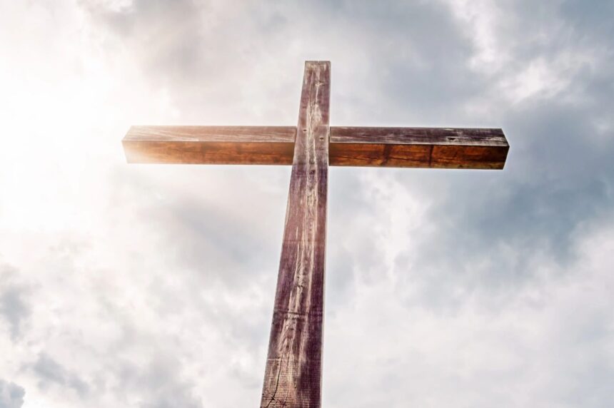 A large cross in the sunlit sky