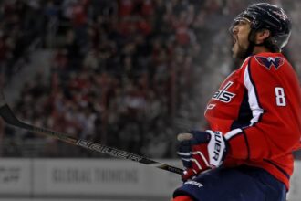 Alex Ovechkin broke Wayne Gretzky’s NHL career goals record with his 895th goal on April 6, 2025, against the Islanders. Gretzky, present at UBS Arena, witnessed the historic moment, marking a new chapter in hockey history.