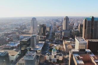 Aerial view of the St. Louis skyline at sunrise