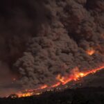 Aerial wildfire and smoke illustrating Indonesia’s forest and peat-fire emergency.