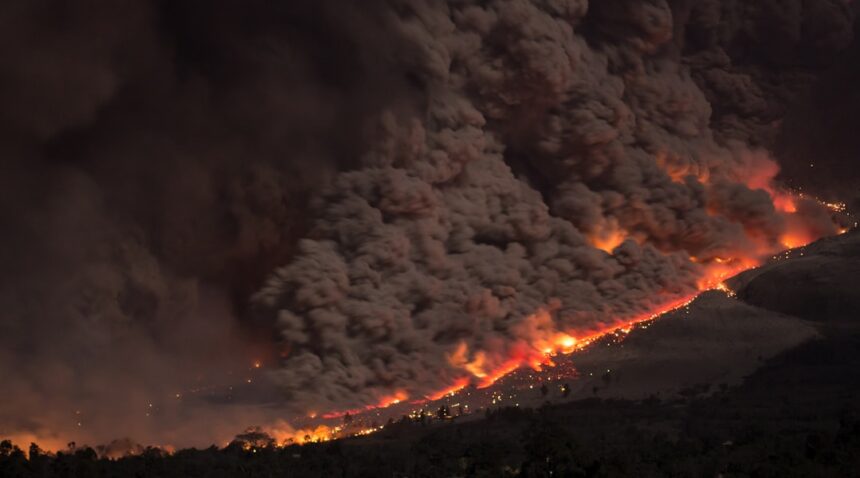 Aerial wildfire and smoke illustrating Indonesia’s forest and peat-fire emergency.