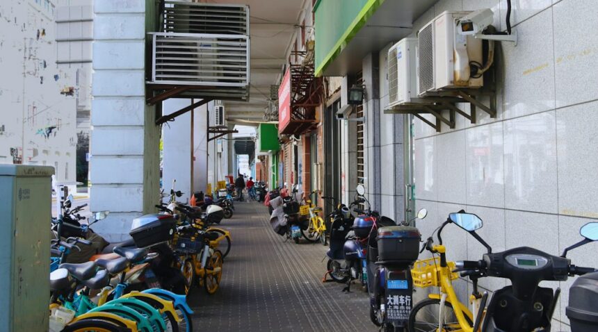 Bicycles and scooters along a walkway
