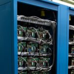 Blue server racks representing the data-center infrastructure behind Google’s planned Finland AI investment.