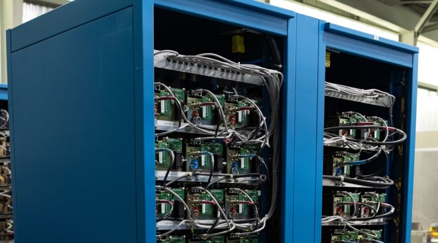 Blue server racks representing the data-center infrastructure behind Google’s planned Finland AI investment.