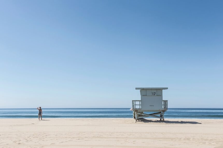 California beach lifeguard tower and ocean illustrating dangerous surf conditions