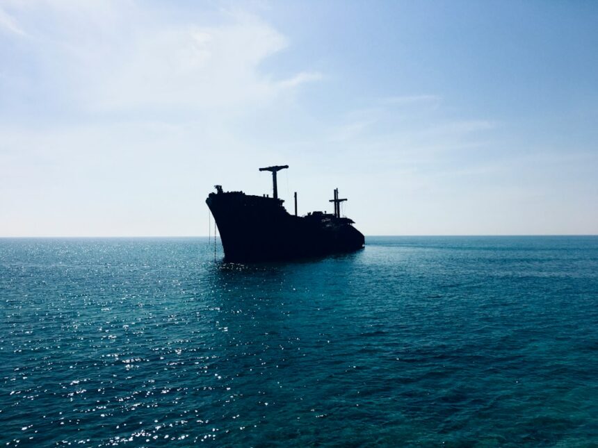 Cargo ship at sea representing shipping through the Strait of Hormuz