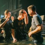 Christian baptism by immersion during a church gathering
