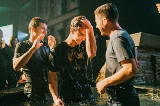 Christian baptism by immersion during a worship gathering