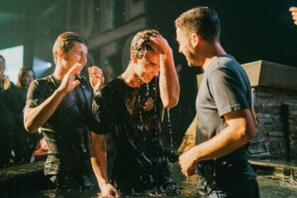 Christian baptism by immersion during a worship gathering