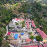 Church in a forested landscape, used as a representative image for Christians in Myanmar