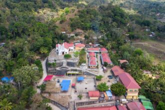 Church in a forested landscape, used as a representative image for Christians in Myanmar