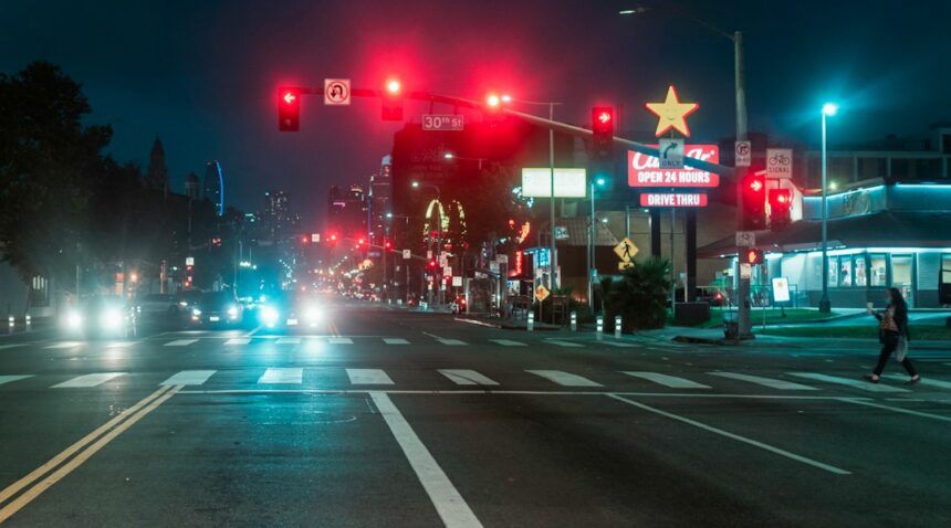 City intersection and traffic lights at night