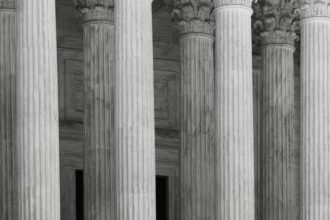Classical courthouse columns representing the American legal system