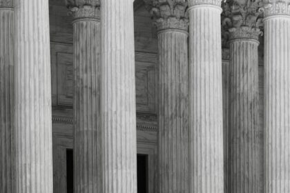Classical courthouse columns representing the American legal system