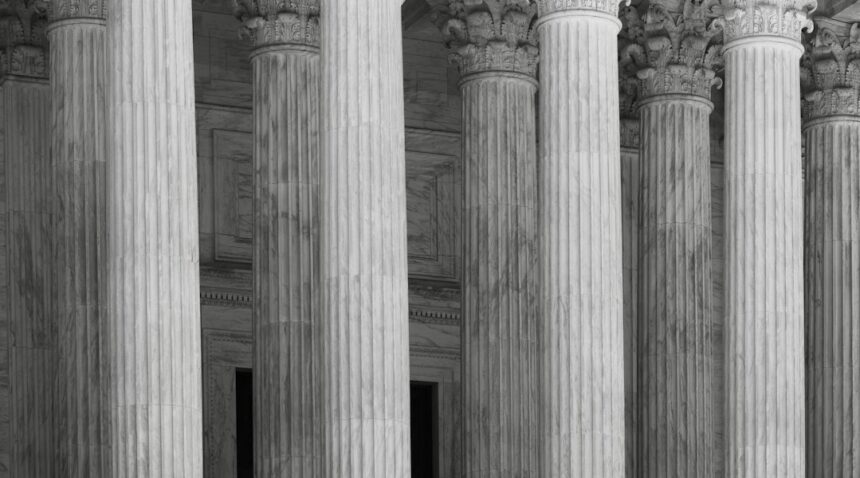 Classical courthouse columns representing the American legal system