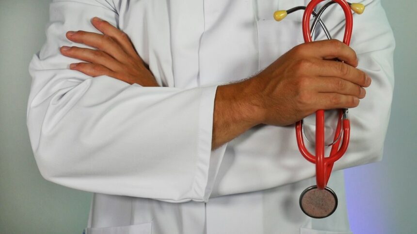 Doctor and stethoscope representing hospital medical care
