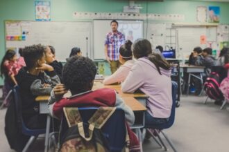 Elementary students learning together in a classroom