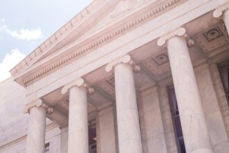 Federal government building illustrating an investigation into a reported FBI data breach