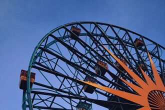 Ferris wheel at sunset, illustrative photo