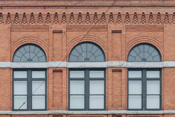 Historic red brick building with arched windows