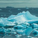 Iceberg floating in an Arctic seascape representing Greenland