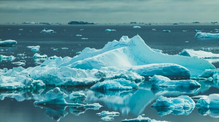 Iceberg floating in an Arctic seascape representing Greenland