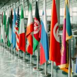 International flags representing trade and diplomatic negotiations