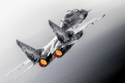 Jared Isaacman beside a MiG-29 fighter jet appearing at the 2026 Pacific Airshow in Huntington Beach