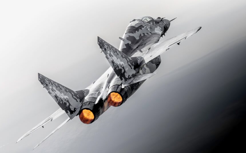 Jared Isaacman beside a MiG-29 fighter jet appearing at the 2026 Pacific Airshow in Huntington Beach