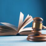Judge's gavel and open law book