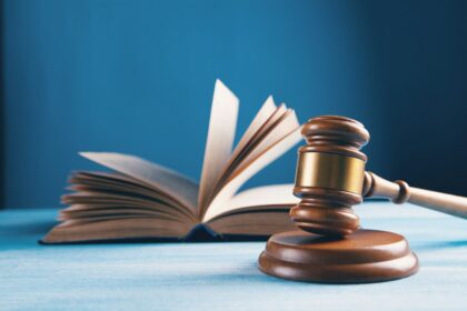 Judge's gavel and open law book