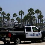 Law enforcement vehicle on a California beach