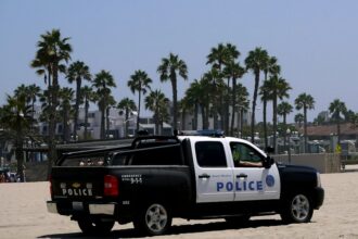 Law enforcement vehicle on a California beach