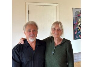 Missionary and former hostage Jeff Woodke with his wife Els and Voice of the Martyrs host Todd Nettleton