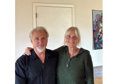 Missionary and former hostage Jeff Woodke with his wife Els and Voice of the Martyrs host Todd Nettleton