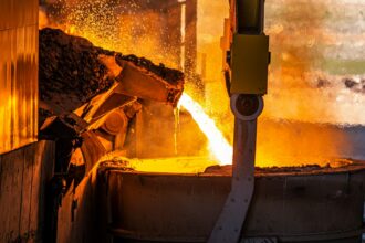 Molten metal pouring in a steel manufacturing facility