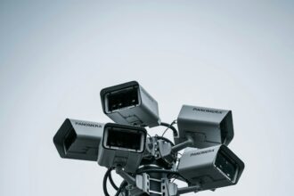 Multiple roadside surveillance cameras mounted on a pole