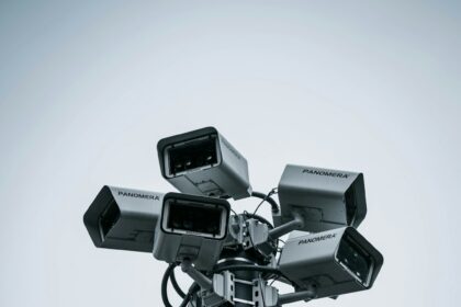 Multiple roadside surveillance cameras mounted on a pole