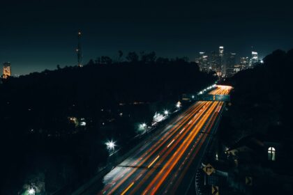 Night freeway traffic illustrating an Orange County rideshare liability case