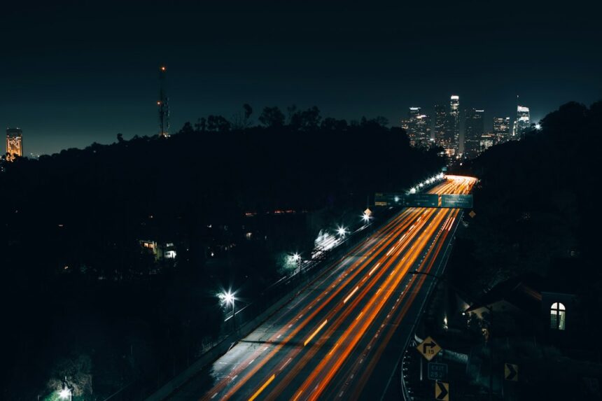 Night freeway traffic illustrating an Orange County rideshare liability case