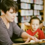 Parent and elementary-age child working together, illustrating parental involvement in education