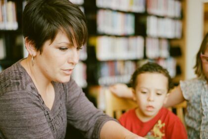 Parent and elementary-age child working together, illustrating parental involvement in education