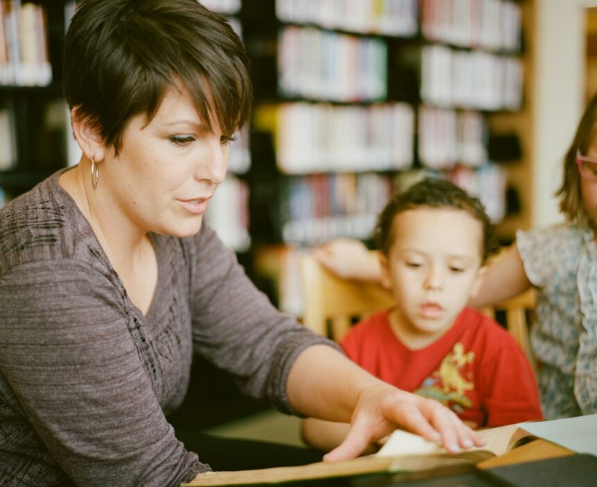 Parent and elementary-age child working together, illustrating parental involvement in education